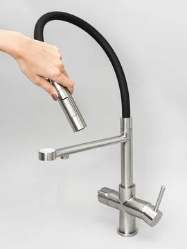Modern pull-down kitchen faucet on white background Stock Photos