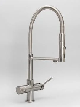 Modern pull-down kitchen faucet on white background Stock Photos
