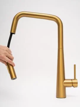 Modern pull-down kitchen faucet on white background Stock Photos