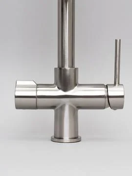 Modern pull-down kitchen faucet on white background Stock Photos