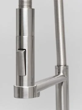 Modern pull-down kitchen faucet on white background Stock Photos