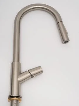 Modern pull-down kitchen faucet on white background Stock Photos