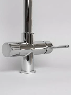Modern pull-down kitchen faucet on white background Fotos Stock