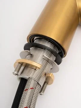 Modern pull-down kitchen faucet on white background Stock Photos