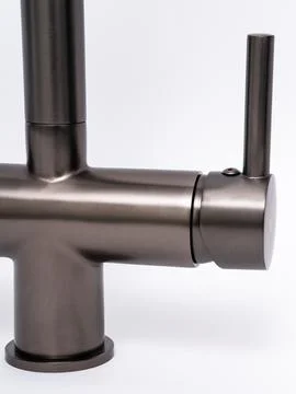 Modern pull-down kitchen faucet on white background 写真素材