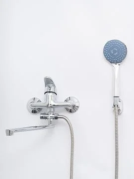 Modern pull-down kitchen faucet on white background Stock Photos