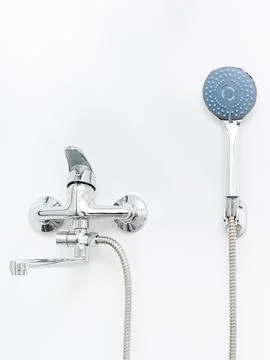Modern pull-down kitchen faucet on white background Stock Photos