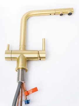 Modern pull-down kitchen faucet on white background Stock Photos