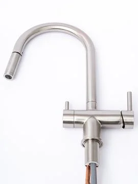 Modern pull-down kitchen faucet on white background Stock Photos