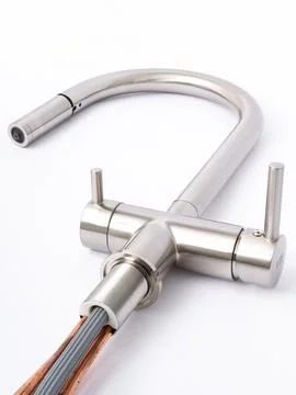 Modern pull-down kitchen faucet on white background Foto stock