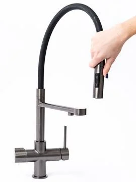 Modern pull-down kitchen faucet on white background Foto stock