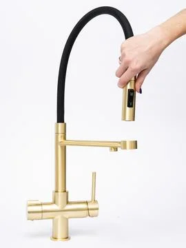 Modern pull-down kitchen faucet on white background Stock Photos