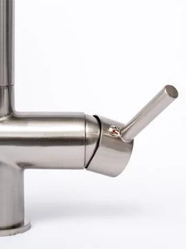 Modern pull-down kitchen faucet on white background Fotos Stock