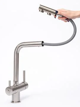 Modern pull-down kitchen faucet on white background Stock Photos