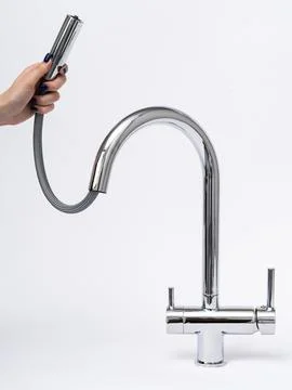 Modern pull-down kitchen faucet on white background Foto stock