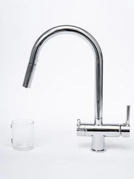 Modern pull-down kitchen faucet on white background Stock Photos