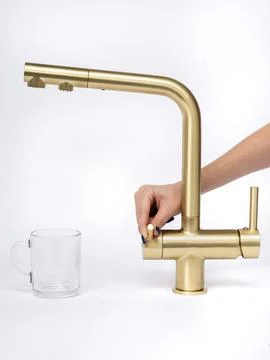 Modern pull-down kitchen faucet on white background 写真素材