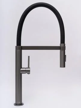 Modern pull-down kitchen faucet on white background Stock Photos
