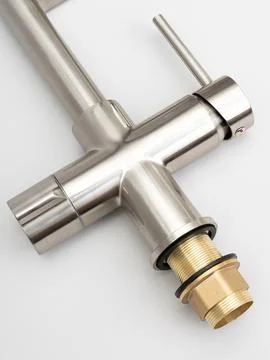 Modern pull-down kitchen faucet on white background Stock Photos