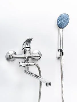 Modern pull-down kitchen faucet on white background Stock Photos