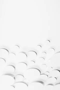 Modern random pattern of white paper ovals different size in shining light wi Stock Photos