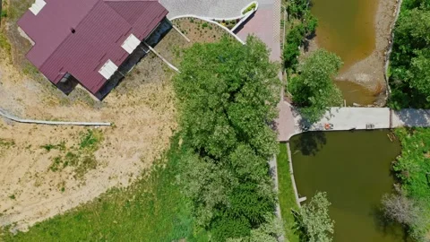 Modern recreation complex in summer. New buildings near the river of a relaxing  Stockbeeldmateriaal 135879287