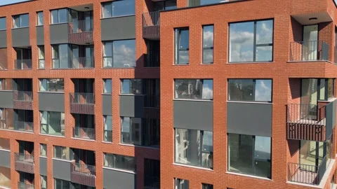Modern Red Brick Apartment Building Aerial View in City Residential Area Stock Footage 346695471