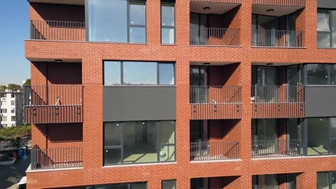 Modern Red Brick Apartment Building Aerial View in City Residential Area Stock Footage 346696739