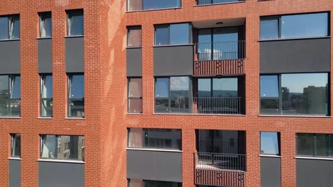 Modern Red Brick Apartment Building Aerial View in City Residential Area Stock Footage 346714313