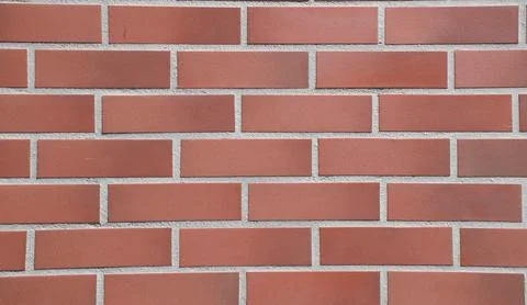 Modern Red Brick Wall Background with Uniform Horizontal Tile Pattern Stock Photos