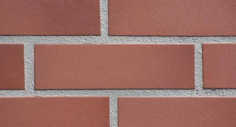 Modern Red Brick Wall Background with Uniform Horizontal Tile Pattern Stock Photos