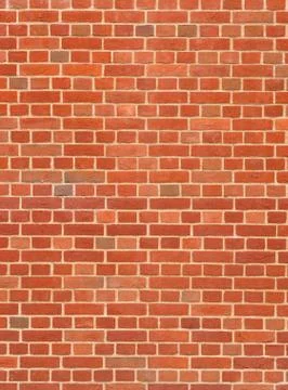 Modern red brick wall close up detail background Photos