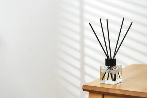 Modern Reed Diffuser on Wooden Table in Minimalist Interior During Daytime Stock Photos