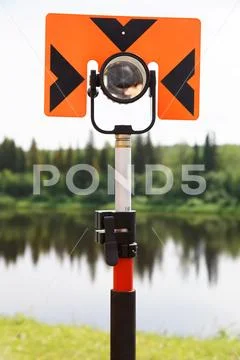 Modern reflector for measuring distances by tachymeter Stock Photos