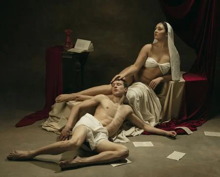 Modern remake of classical artwork - young medieval couple on dark background Stock Photos