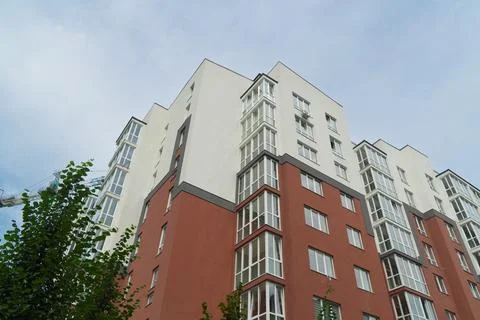 Modern residential building facade in final phase of construction Stock Photos