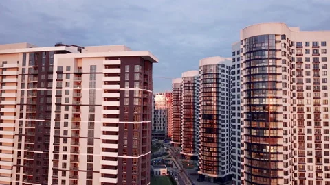 Modern residential building under constructionat sunset. Drone shot. 4K Stock Footage 131818151