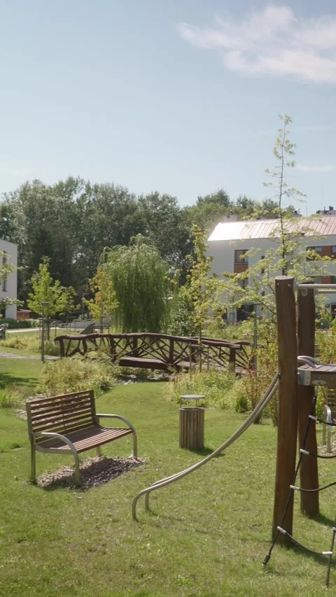 Modern Residential Complex Courtyard with Playground and Green Spaces Stock Footage 309529211