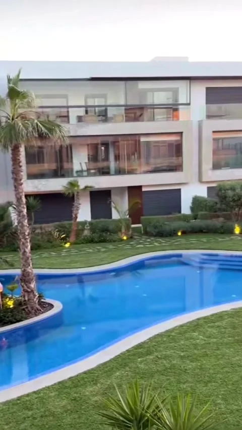Modern Residential Complex with Pool and Sunset View Stock Footage 331743131