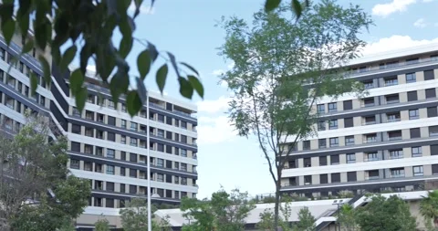 Modern residential complex surrounded by trees Vídeo Stock 336668785