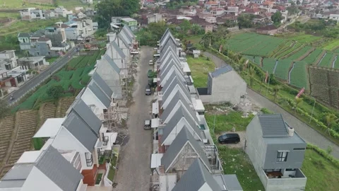Modern Residential Development Surrounded by Verdant Fields in a Picturesqu.. Stock Footage 311127773