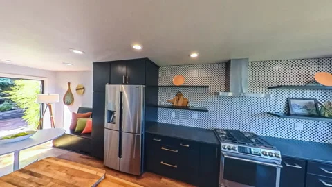 Modern residential kitchen and dining area; rotational view Stock Footage 249956922