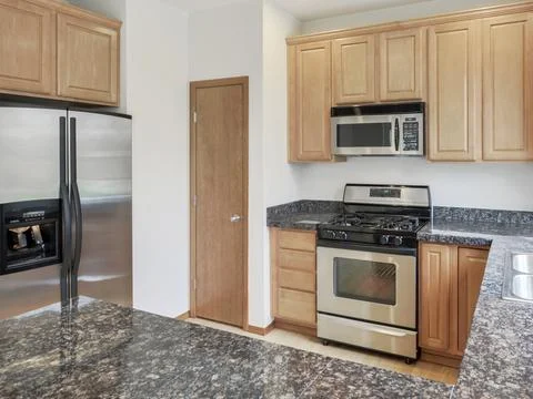 Modern residential kitchen interior Stock Photos