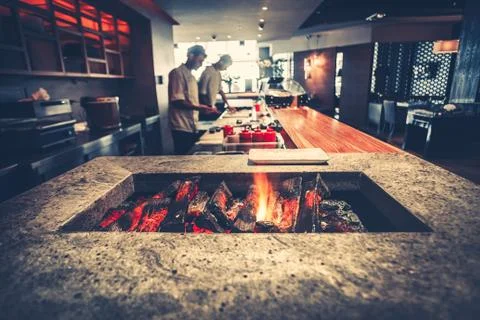 Modern restaurant with fireplace Stock Photos