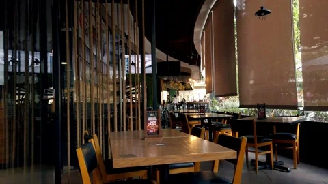 Modern Restaurant Interior With Empty Dining Tables And Contemporary Design Stock Footage 337532379