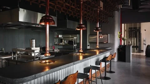 Modern restaurant interior with open kitchen. Dining hall, tables, kitchen with 스톡 동영상 317553247