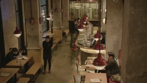 Modern Restaurant Interior with People Dining and Socializing in Beijing, China Stock Footage 345762026