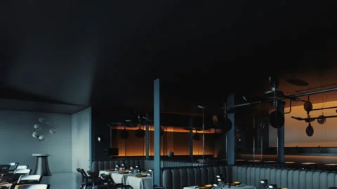 Modern restaurant interior with tables and lighting in a city setting Stock Footage 343576267