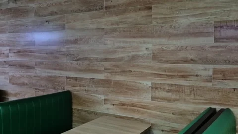 Modern Restaurant Interior With Wooden Wall and Booth Seating Video stock 336518436