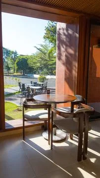 Modern restaurant or cafe interior with table and chairs Stock Photos